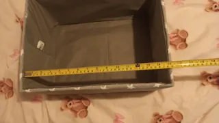 Caja rectangular forrada de tela gris