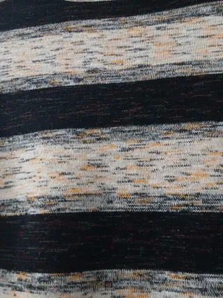 Jersey lana cuello alto rayas beige y negro