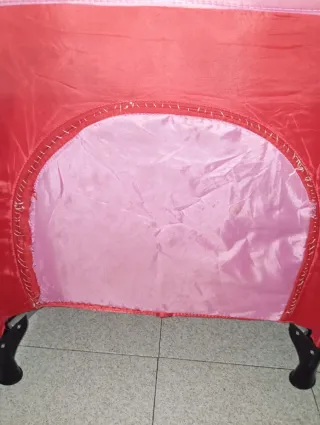 Cuna de viaje rosa y roja