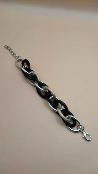 Pulsera eslabones dorados ,plateado y negros