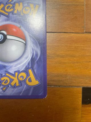 Carta Pokémon Reshiram y Charizard GX