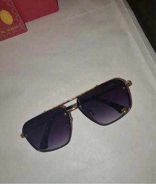 Gafas Cartier Negras y Doradas