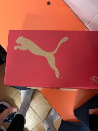 Botas de fútbol Puma negras y verdes