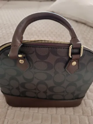 Mala Coach Castanho Dourado