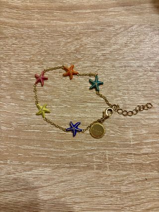 Pulsera estrellas de mar dorada multicolor