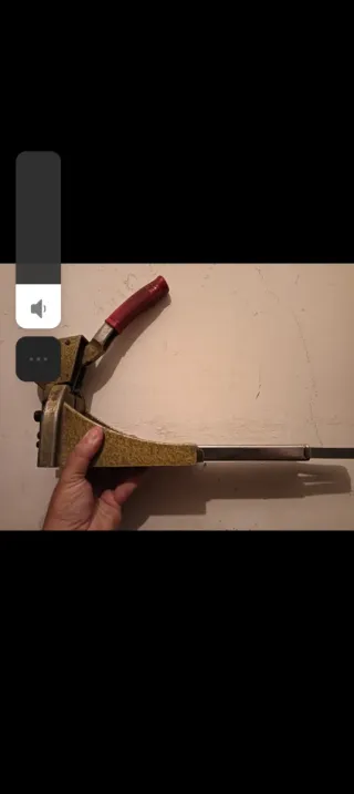 Antigua grapadora manual