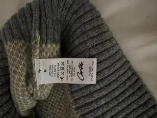 Jersey Corteiz beige y gris