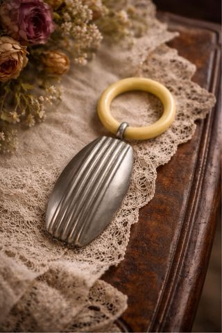 Antico sonaglio bimbo Art Déco