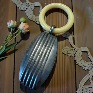 Antico sonaglio bimbo Art Déco