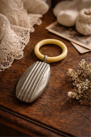 Antico sonaglio bimbo Art Déco