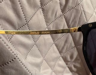 Gafas de sol Charles Jourdan negras y doradas