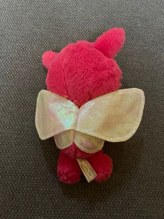 Peluche Loola con alas brillantes