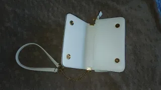 Bolso Yves Saint Laurent blanco y dorado
