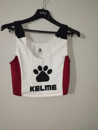 Top deportivo Kelme blanco y rojo talla L