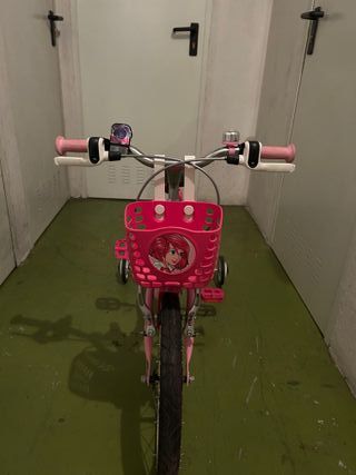 Bicicleta niña rosa con cesta