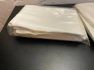 2 Pacotes de Toalhetes de Mesa Brancos