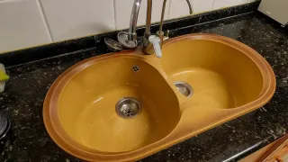 Muebles de cocina, fregadero y campana