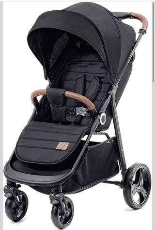 Silla de paseo negra para niños grandes.