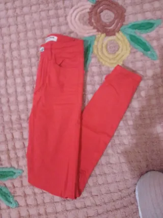 Jeans rossi skinny strappati