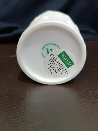 Candela profumata   in porcellana bianca