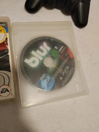 PS3 Super Slim + 2 mandos (1 nuevo) + juegos