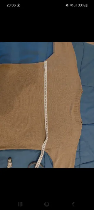 Maglione marroncino con frange