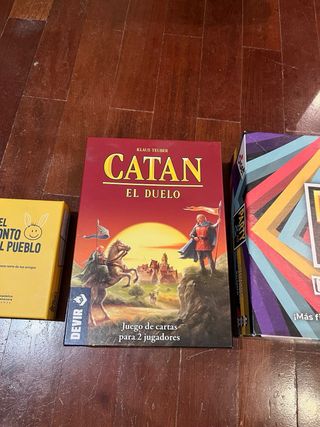 Juegos de mesa Catan y Party & Co