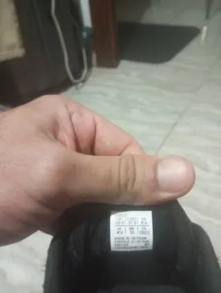 Zapatillas running Asics negras y rosas