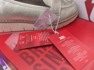 Zapatos dorados/plateados XTI