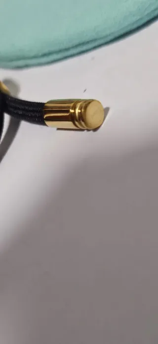 Pulsera Tiffany & Co. Negra y Dorada