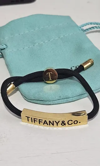 Pulsera Tiffany & Co. Negra y Dorada