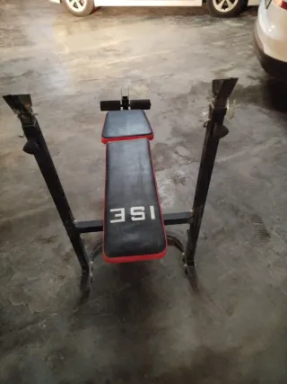 Banco de pesas + Barra + 2 discos 20kg