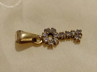 Ciondolo chiave oro giallo 18 KT con zirconi