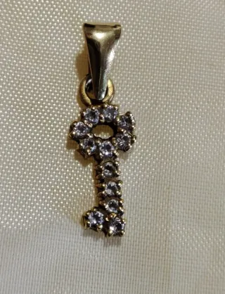 Ciondolo chiave oro giallo 18 KT con zirconi