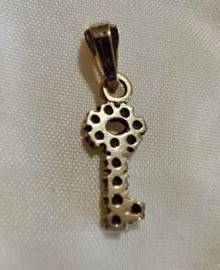 Ciondolo chiave oro giallo 18 KT con zirconi