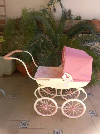 Coche de muñecas Daniela rosa