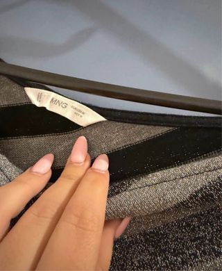 Top asimétrico de rayas