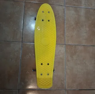 Monopatín Penny Amarillo