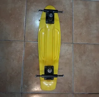 Monopatín Penny Amarillo