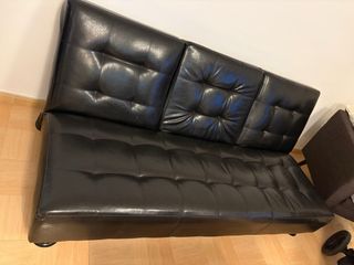 Sofá-cama negro de piel