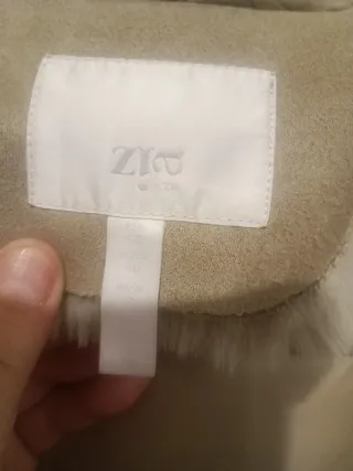 Plumífero mitad ante con capucha