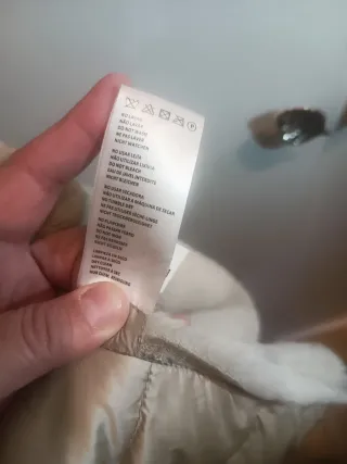 Plumífero mitad ante con capucha