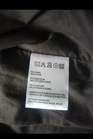 Cazadora de piel marrón oscura de Emidio Tucci.