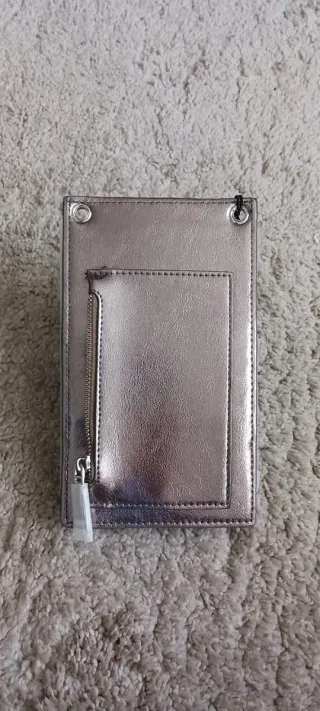 Funda móvil Parfois sin usar con etiquetas