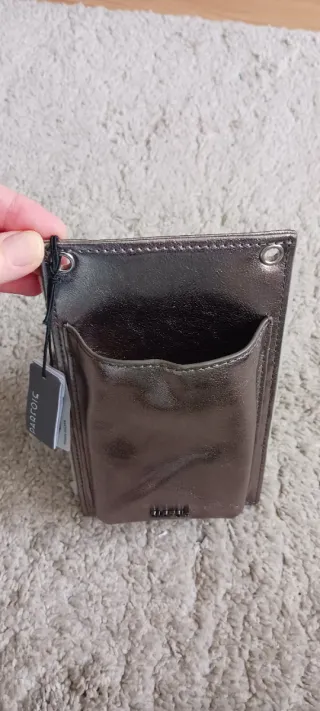 Funda móvil Parfois sin usar con etiquetas