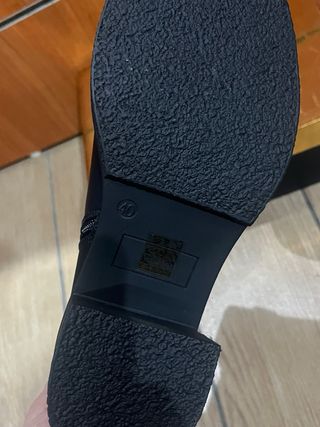 Stivali neri con fibbia