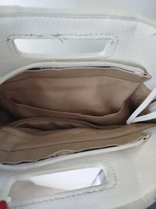 Bolso blanco con flecos