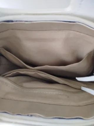 Bolso blanco con flecos