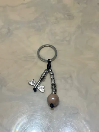 Pulsera Parfois y Llavero tipo uno de cincuenta