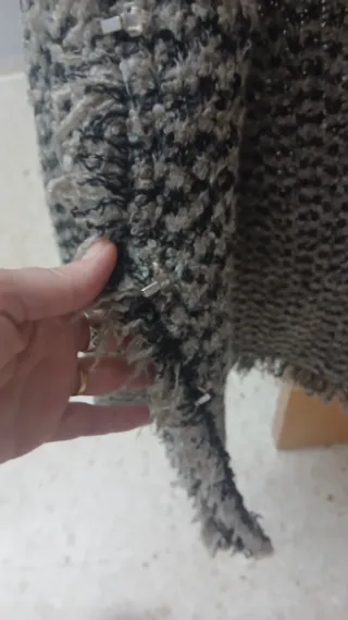 Chaqueta marrón con flecos